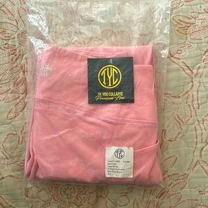 NWT. Size:L. Brand: TIL YOU COLLAPSE. Color: Baby pink or Dusty Pink.
